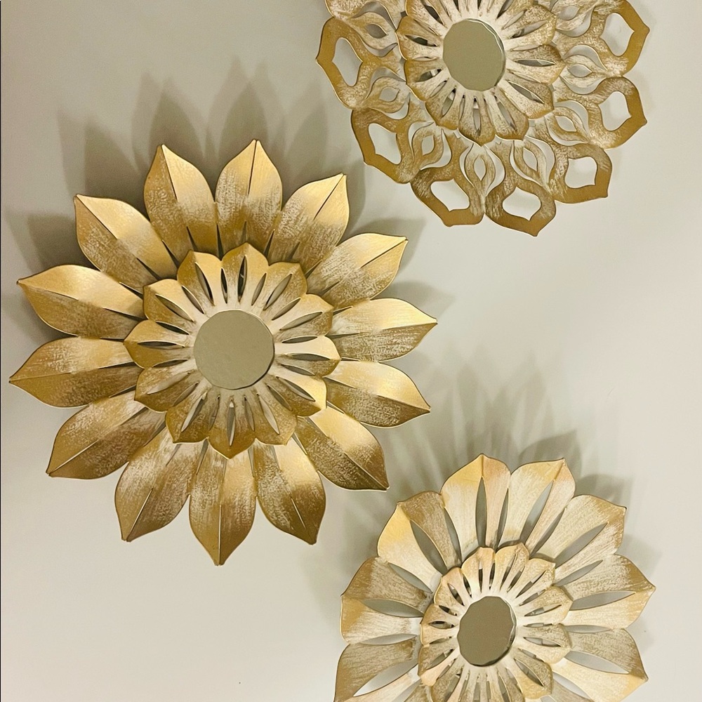 Three different beautiful flowers of metal. Like new